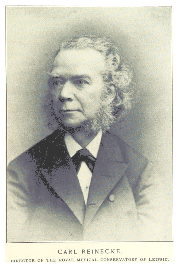 Schwarzes und weißes Foto von Carl Reinecke, Direktor des Königlichen Musik-Konservatoriums Leipzig, der einen Anzug trägt, mit Text unten.