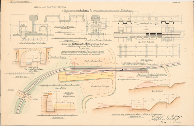 Altes Buch mit detaillierten Zeichnungen und Text eines Bahnhofslayouts, einschließlich einer Illustration einer Eisenbahnschiene.