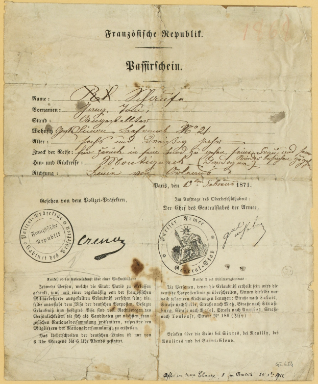 Altes deutsches Regierungsdokument mit einem schwarzen, kreisförmigen Stempel auf vergilbtem Papier, geschrieben in schwarzer Tinte.
