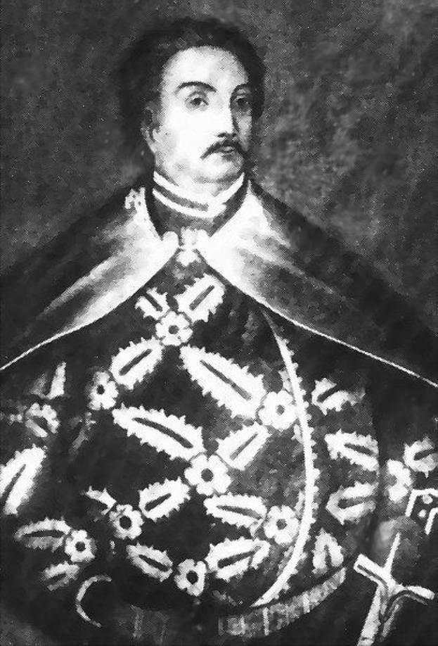 Schwarzes und weißes Foto von Papst Johannes Paul II. in Priesterrobe, der eine schwarze Robe mit weißem Kragen und Manschetten trägt, die Hände gefaltet, strenger Gesichtsausdruck, direkter Blick.